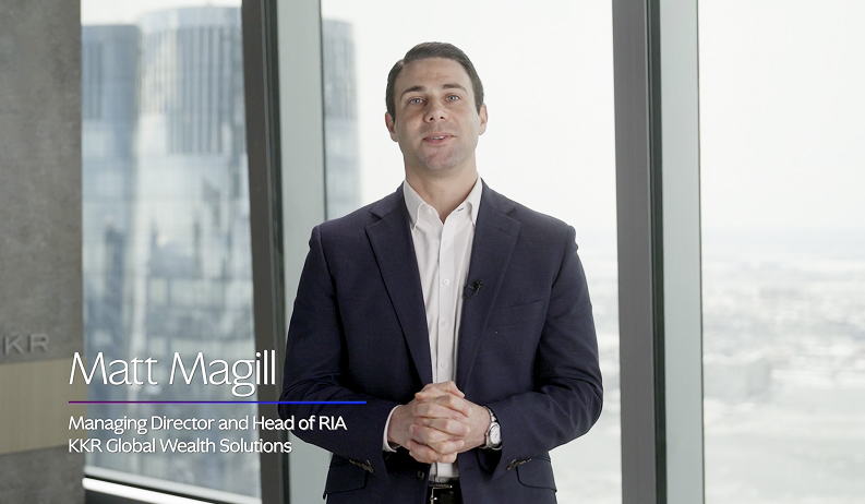 Matt Magill, Head of RIA, KKR Global Wealth Solutions stands in front of a window speaking.